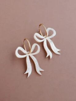 Wolf & Moon Bow Hoops In Cream 15 Wolf & Moon Bow Hoops In Cream -Wolf & Moon bow hoops cream lifestyle 1