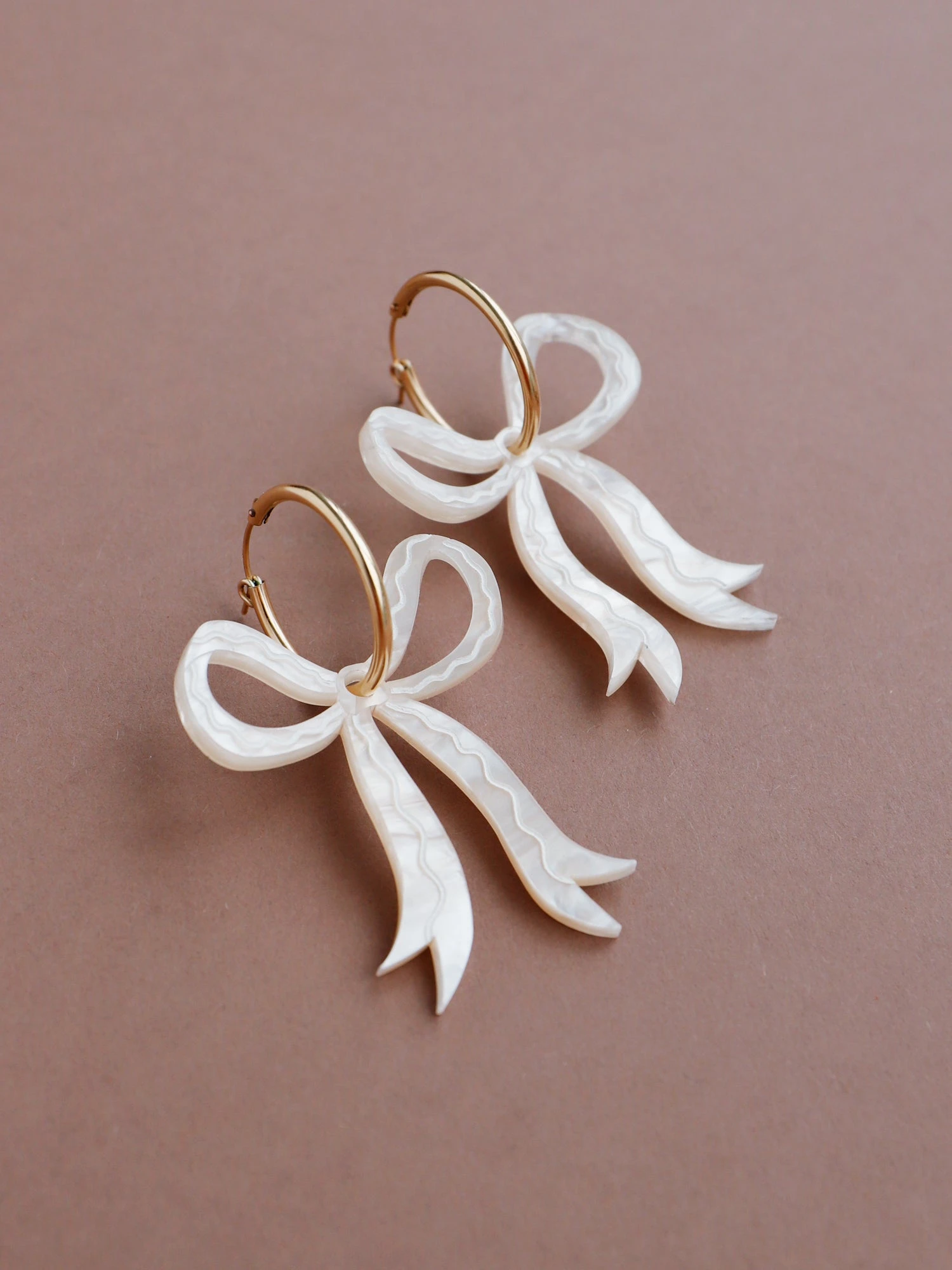 Wolf & Moon Bow Hoops In Cream 6 Wolf & Moon Bow Hoops In Cream - Image 4