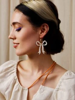 Wolf & Moon Bow Hoops In Cream 18 Wolf & Moon Bow Hoops In Cream -Wolf & Moon bow hoops cream model 1