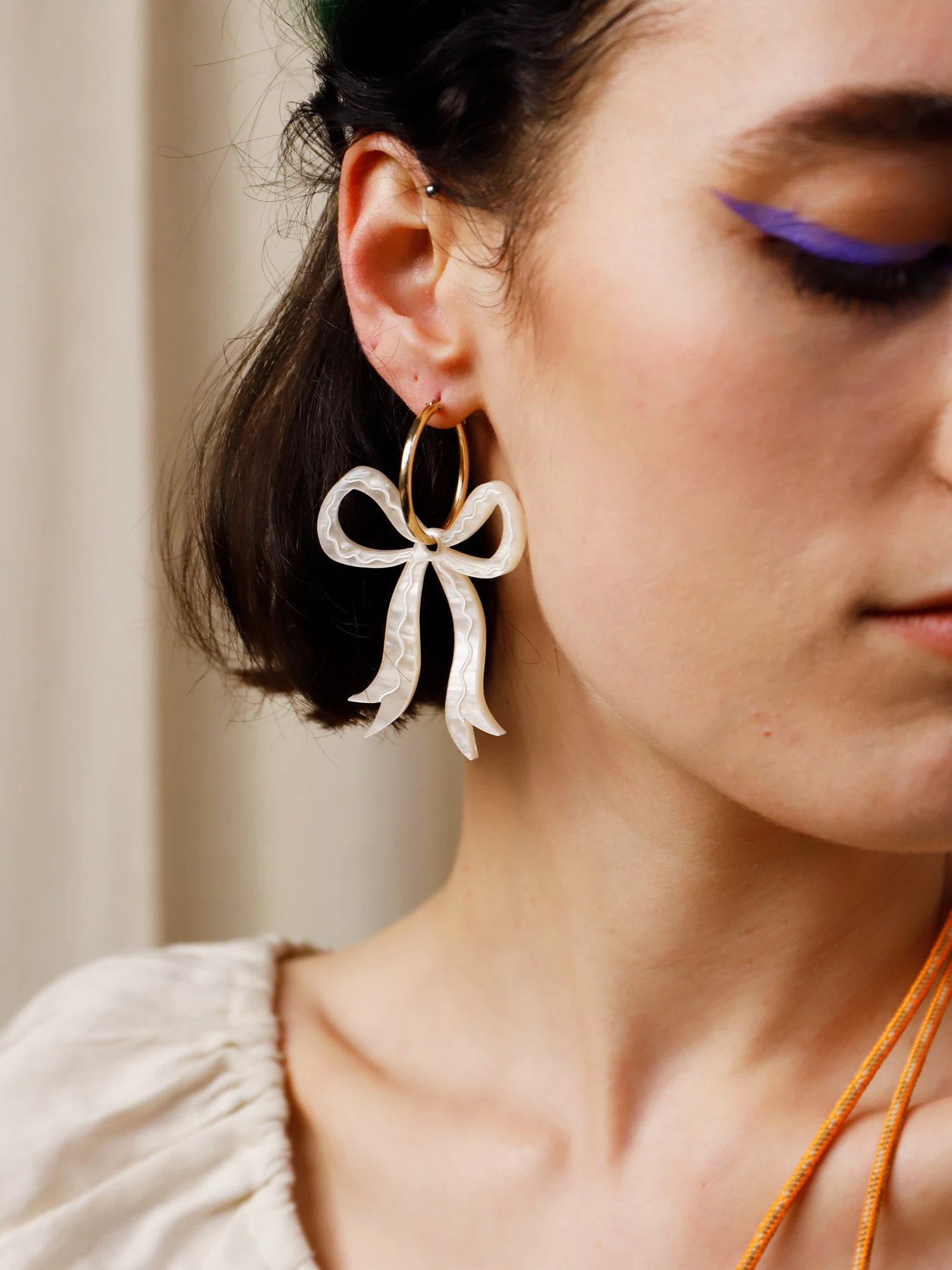 Wolf & Moon Bow Hoops In Cream 5 Wolf & Moon Bow Hoops In Cream - Image 3