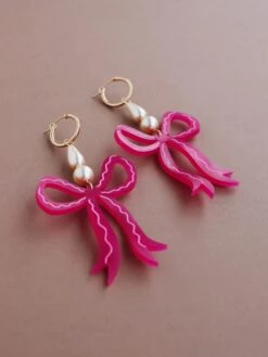Wolf & Moon Bow Statement Hoops In Magenta -Wolf & Moon bow statement hoops magenta lifestyle 2