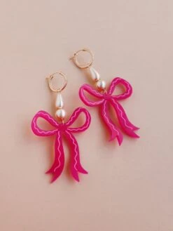 Wolf & Moon Bow Statement Hoops In Magenta -Wolf & Moon bow statement hoops magenta lifestyle 4