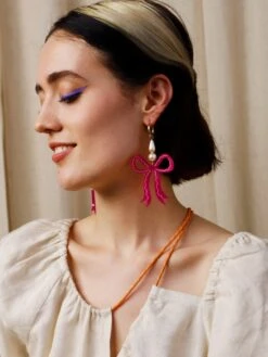 Wolf & Moon Bow Statement Hoops In Magenta -Wolf & Moon bow statement hoops magenta model 1