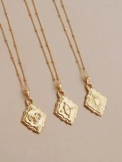 Wolf & Moon Zodiac Necklace - Gold -Wolf & Moon zodiac pendants gold lifestyle group 3